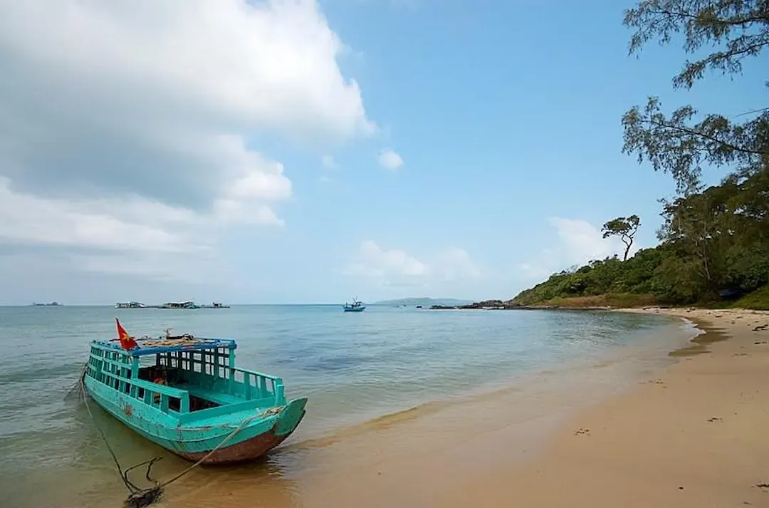 Traditional Fishing Boat on the Sandy Shore of Ganh Dau Beach Phu Quoc