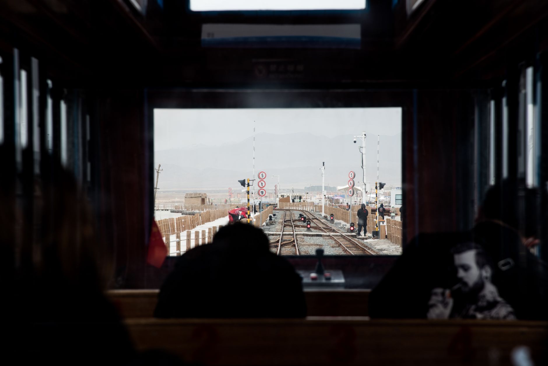 View from inside a Vietnamese train carriage looking out at the coast