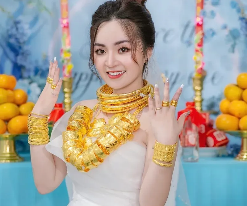 Woman Wearing Gold Jewellery on Her Wedding