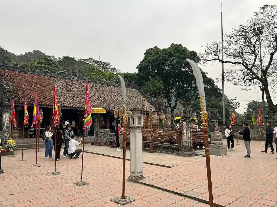 Nhat Tru One Pillar Pagoda Ancient Temple Gate Stone Archway With Traditional Curved Roof Buddhist Architecture in Hoa Lu Ancient Capital Ninh Binh Unesco World Heritage Site