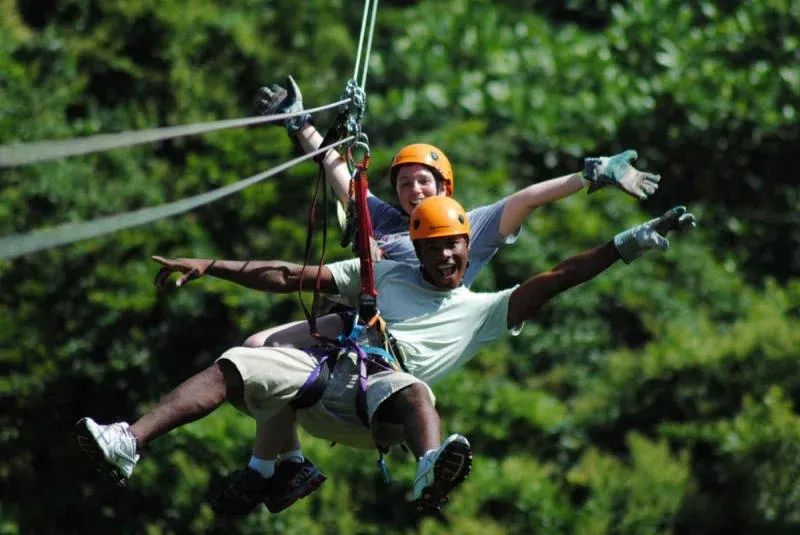 Tourists Ziplining During Sapa Glass Bridge Tour