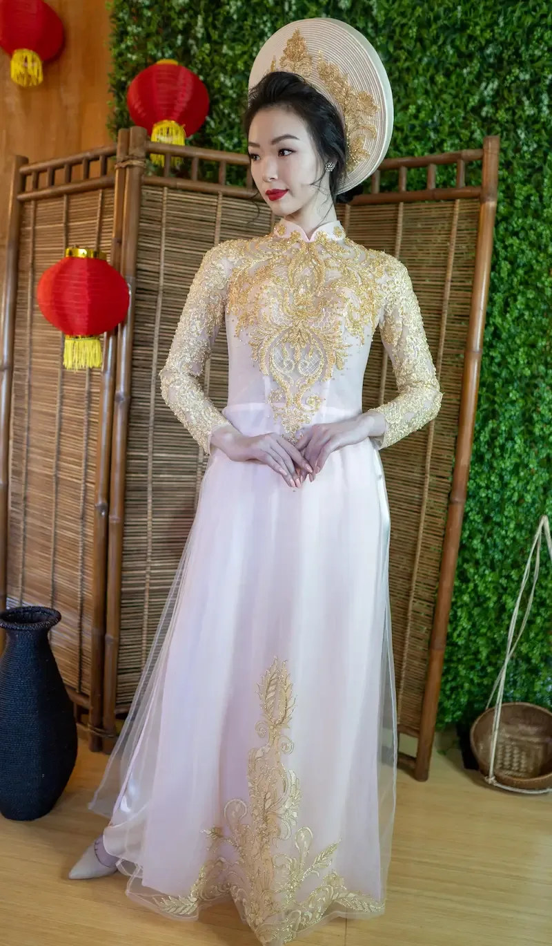 Golden Ao Dai Symobilises Royalty in Vietnam