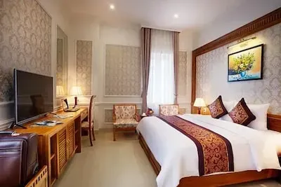 Phòng nghỉ cổ điển ở khách sạn Riverside Quảng Bình