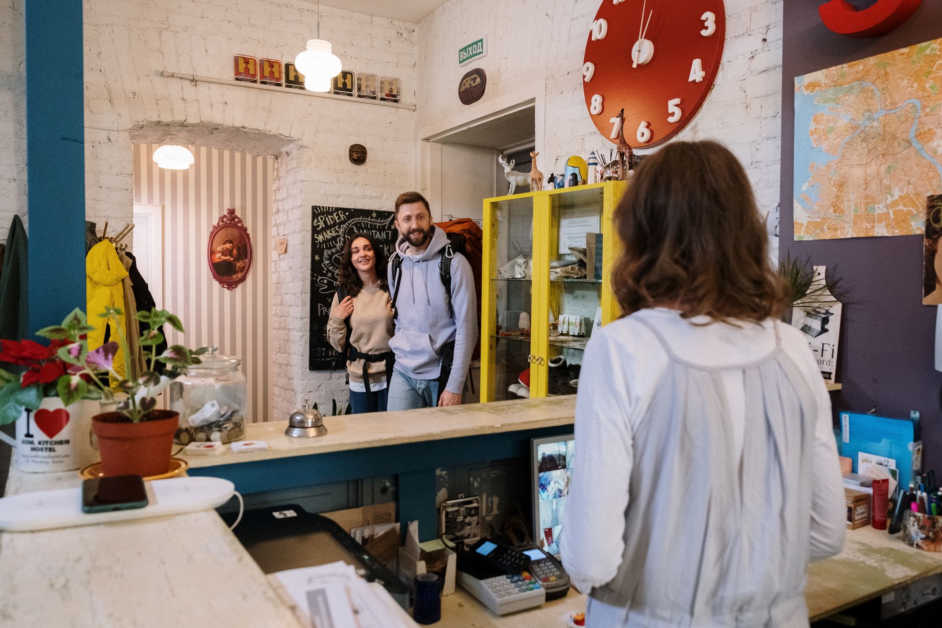 Guests at the counter of a small independent guesthouse in Vietnam