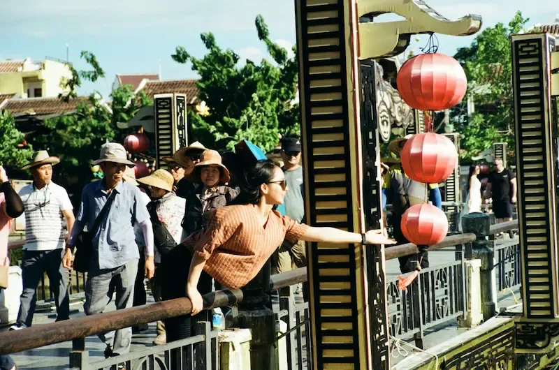 7. Tourists on the Way to the Cafe Apartment in Saigon