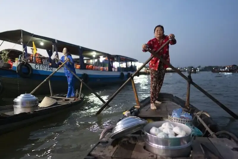 Local Fisher Women on Their Boats in Can Tho, Vietnam