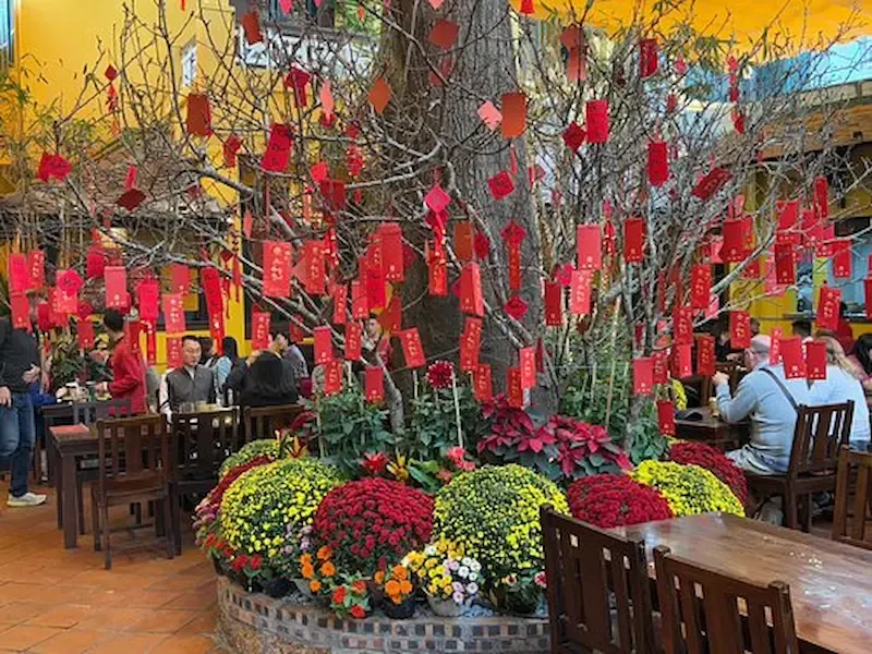 a Busy Restaurant Serving Customers During Tet in Hanoi
