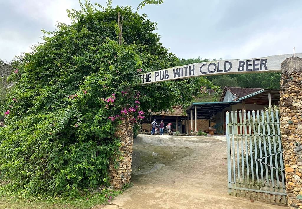 Entrance to the Pub With Cold Beer in Phong Nha, Vietnam, Surrounded by Greenery