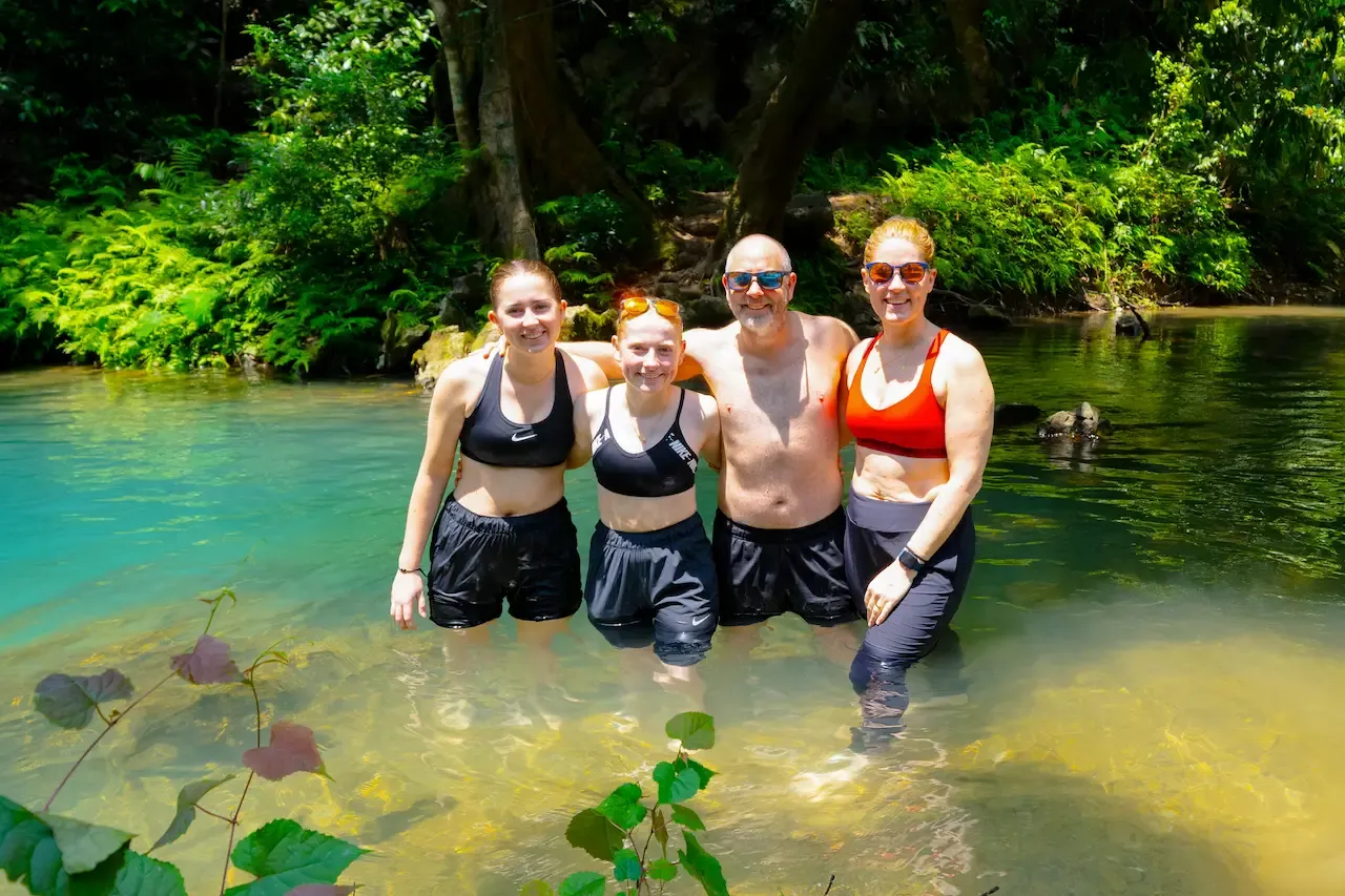 A family enjoying an eco tour in Phong Nha, Vietnam with Jungle Boss adventure tours