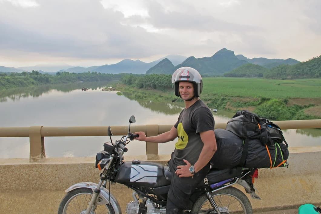 a Bike Rider on Vietnam Tour With His Gear on Travelling the Hanoi to Ho Chi Minh Route