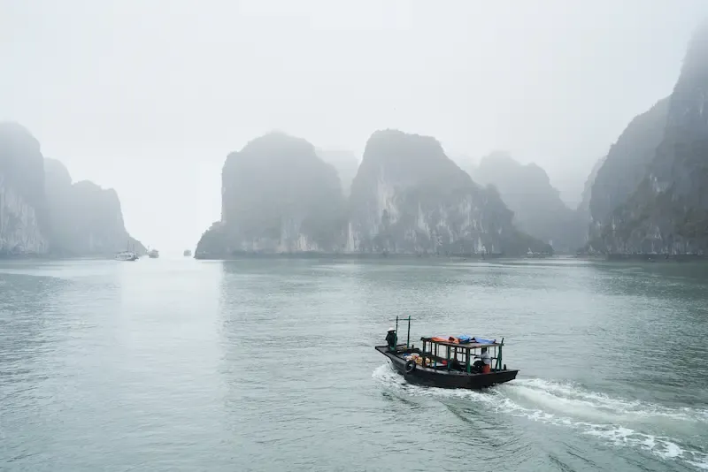 Halong Bay karst peaks shrouded in mist