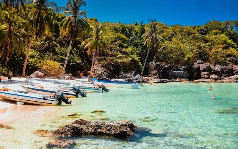 Bai Khem Beach Phu Quoc top 50 world beaches with powder white sand, crystal clear turquoise waters and luxury tropical fishing boats