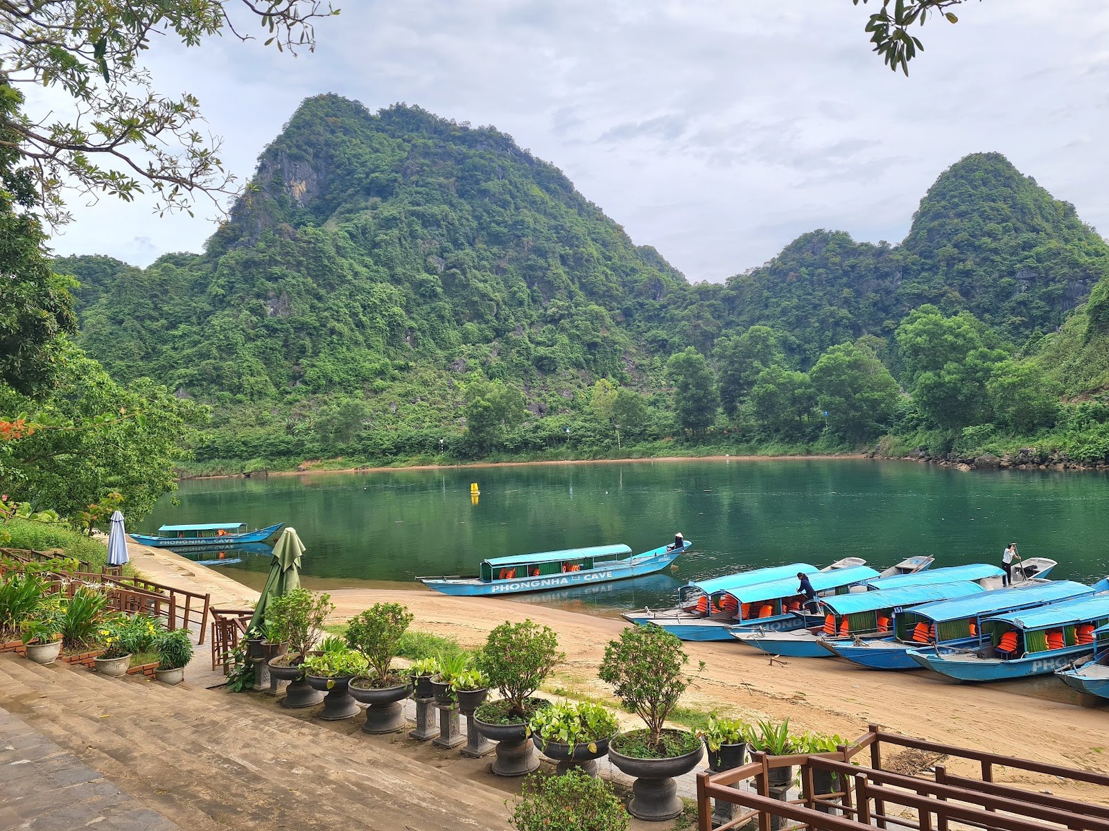 Tour boats moored at the Phong Nha cave boat station