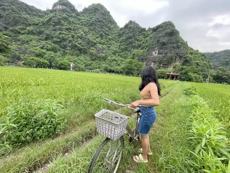 Cycling Early Morning in a Local Village of Trang an Area of Ninh Binh