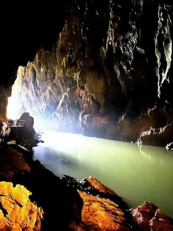 a Section of Dark Cave in Phong Nha Filled With Water During Rainy Season