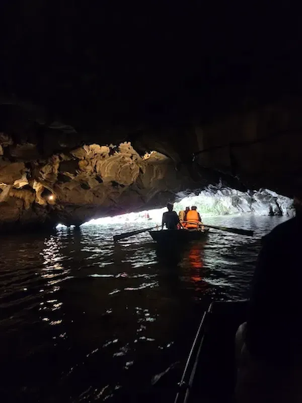 Mind Your Head When Going Under a Cave During Tam Coc Boat Ride