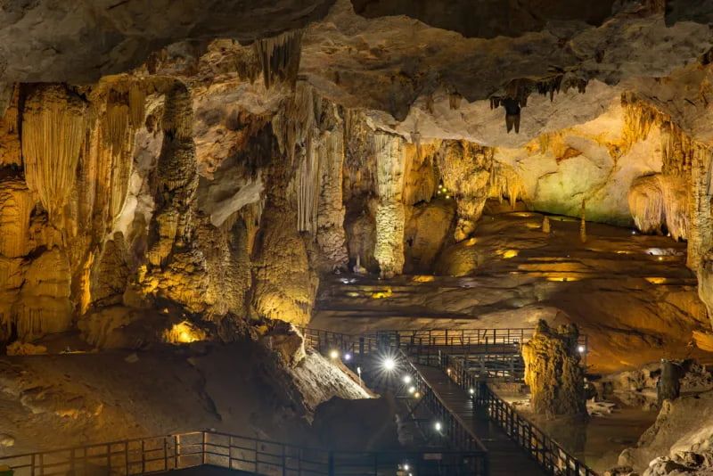 4. Stunning Interior of Heaven Cave With Stalactites and a Wooden Pathway in Phong Nha