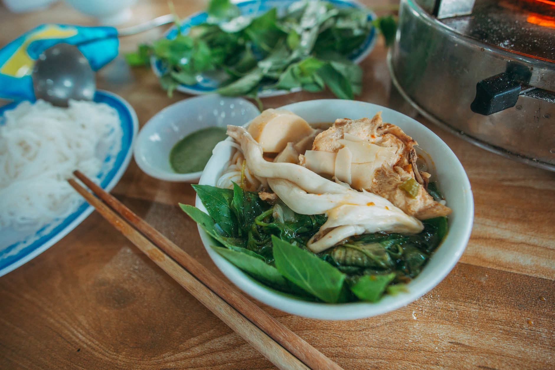 Tofu, greens and rice noodles at a chay vegetarian place in Vietnam