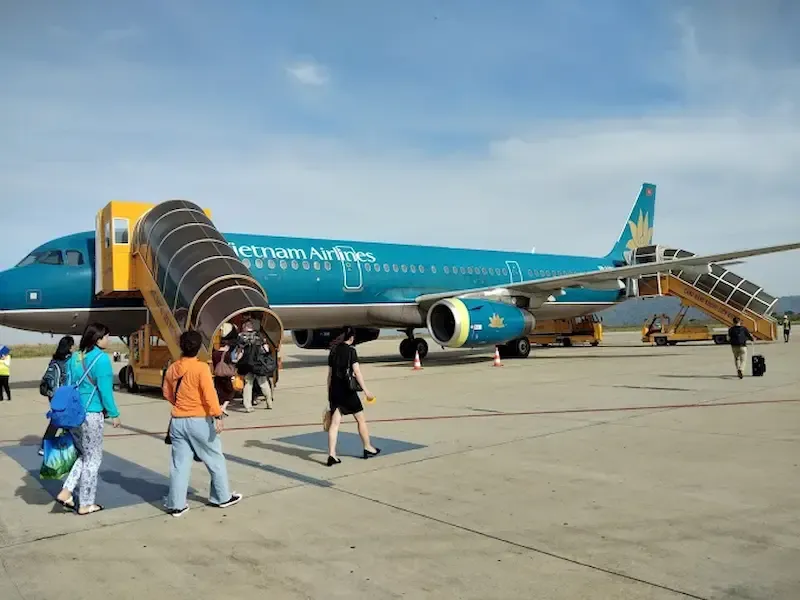 Passenger Boarding a Flight on Lien Khuong International Airport Near Dalat