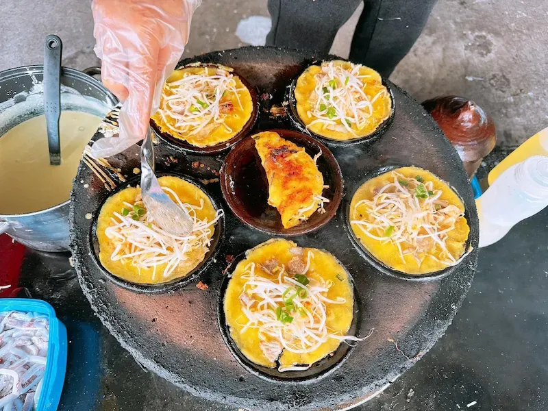 Banh Xeo Dish Being Served in Ba Chieu Market Street
