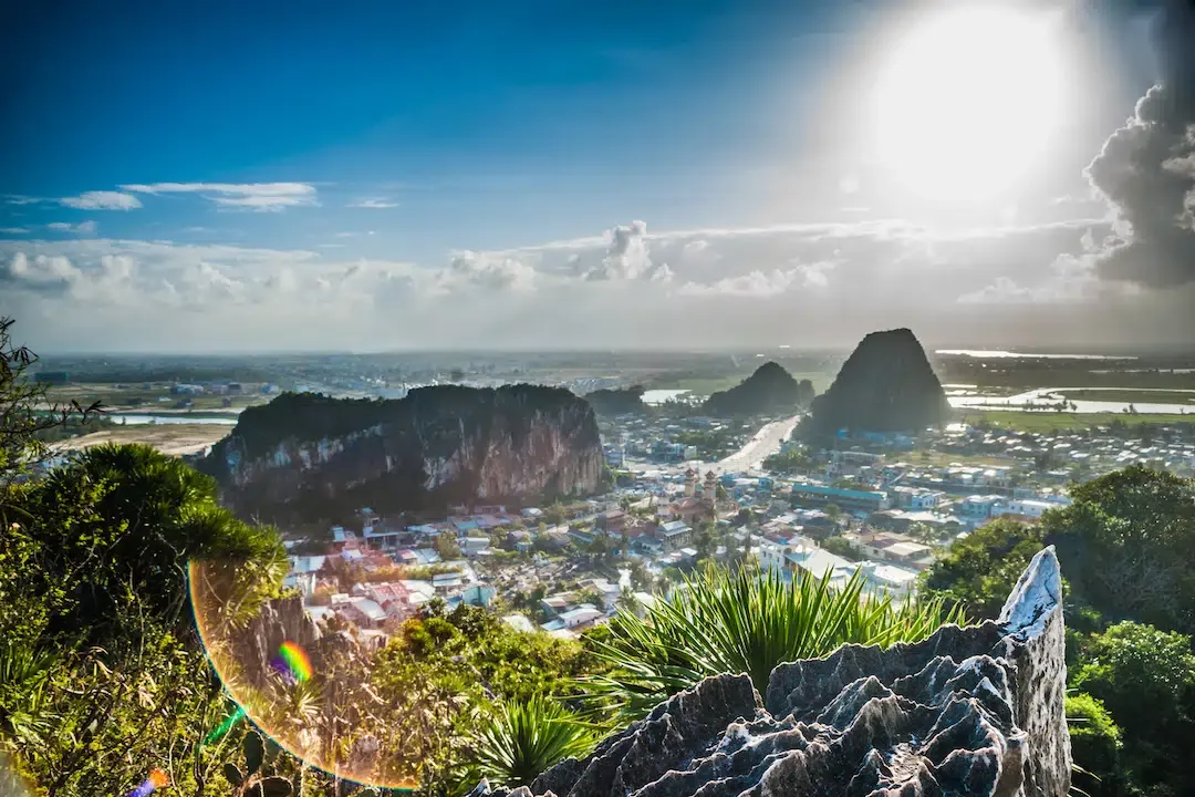 Panoramic view of the coast and city from the peak of Marble Mountains a popular stop on the way from Hue to Hoi An.