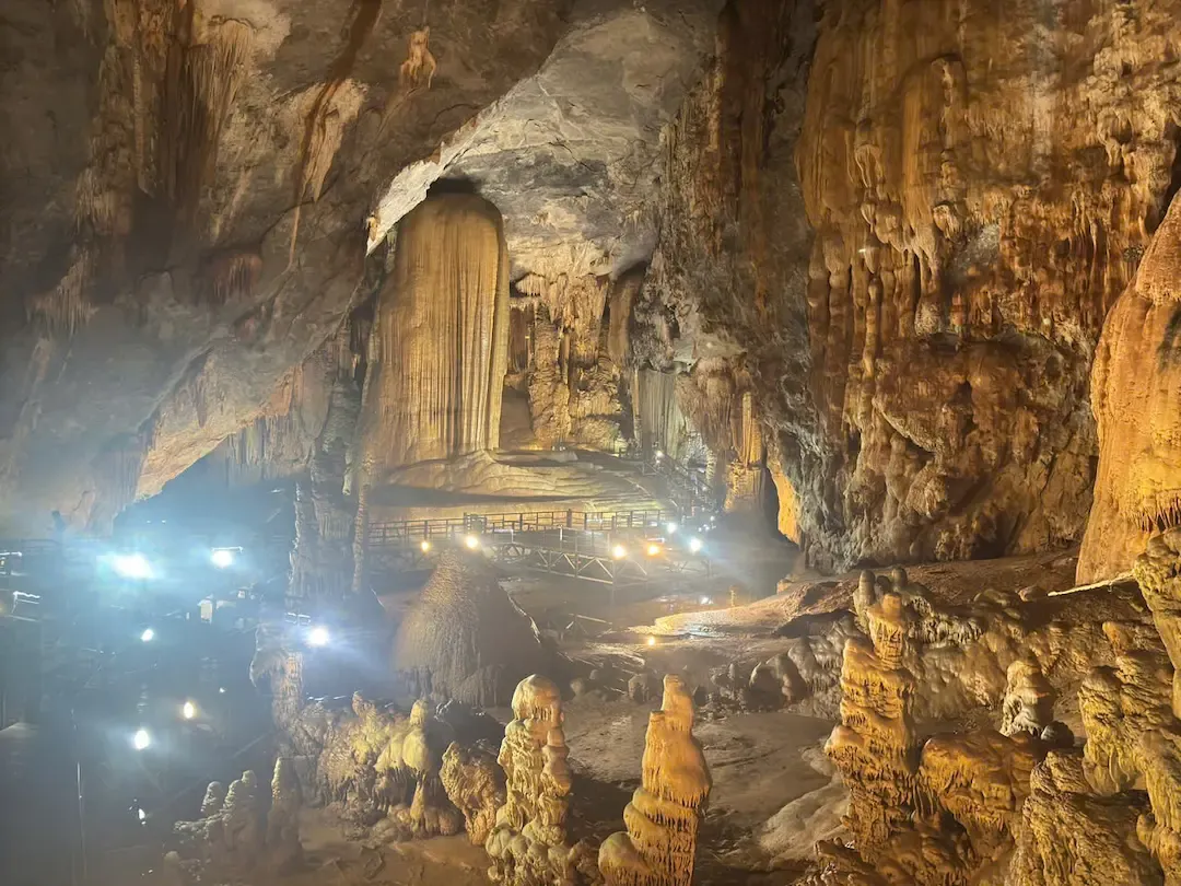 Paradise Cave chamber showing tall stalactite columns and limestone formations at Phong Nha Vietnam