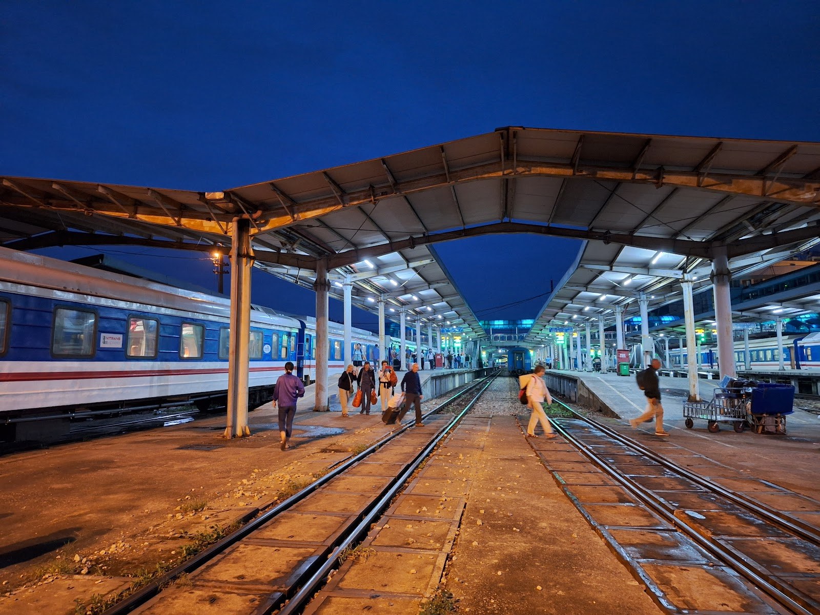 A train waiting at the platform in Hanoi Railway Station at dusk
