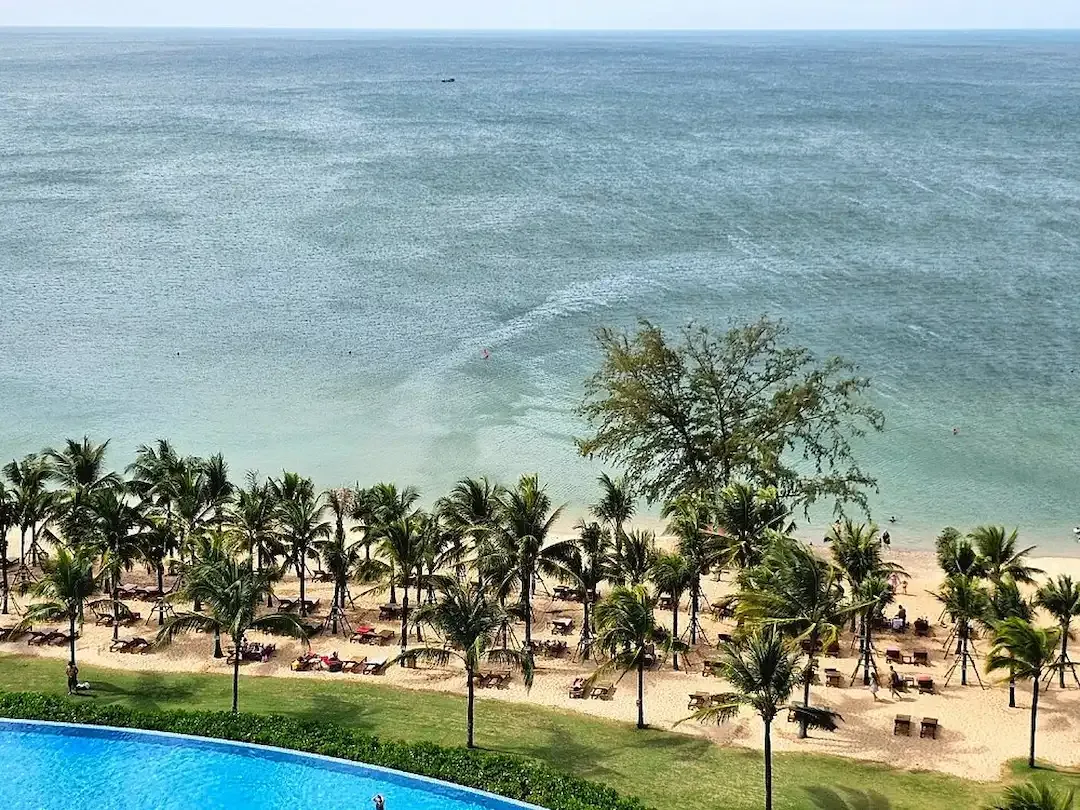 Palm Lined Ong Lang Beach With Turquoise Sea and Beachfront Resort in Phu Quoc Island