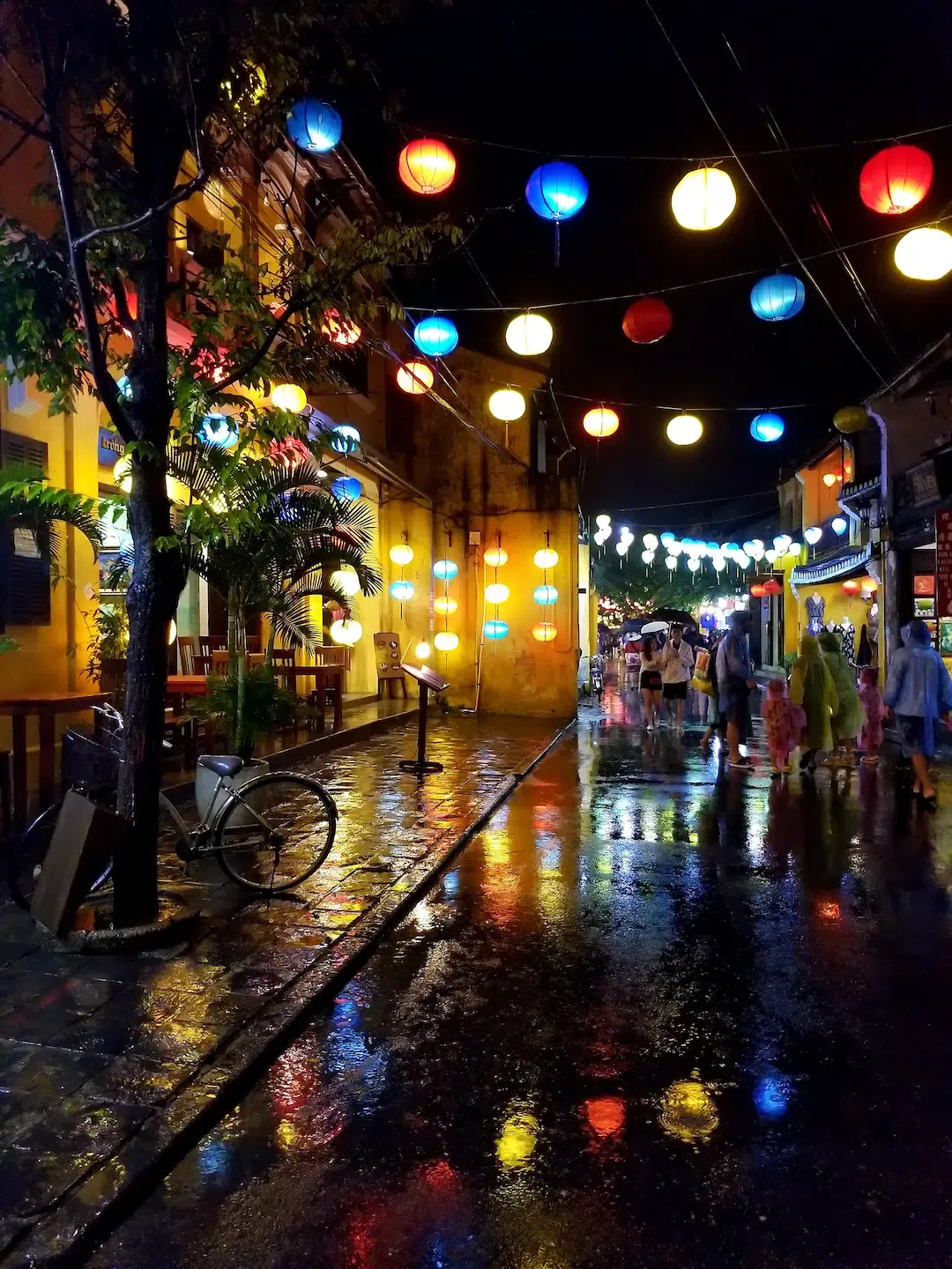 Hoi an Old Street With Lanterns During Rain