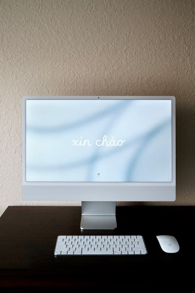 Greeting in Vietnamese Displayed on a Computer Monitor