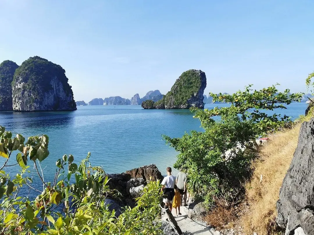 Empty Pristine Beach at Bai Tu Long Bay With Crystal Clear Turquoise Water, Limestone Cliffs, and Lush Vegetation   Less Crowded Than Ha Long Bay