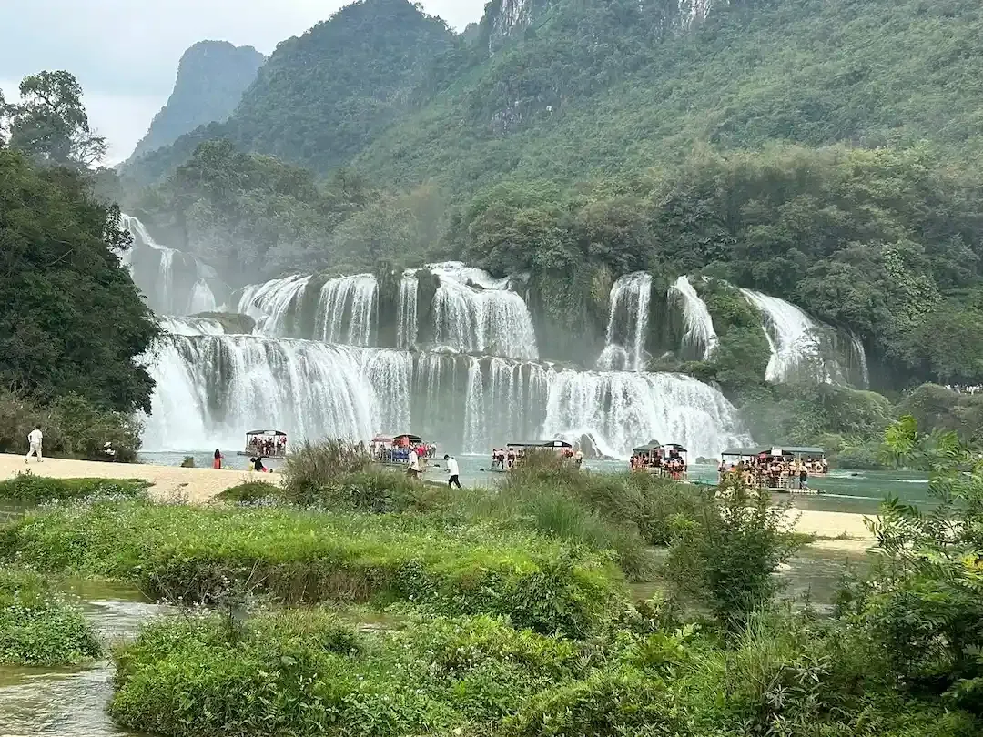 Ban Gioc Waterfall Vietnam With Boats and Karst Mountains