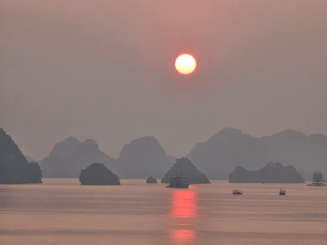 An Iconic Limestone Rock Formation Rising From Lan Ha Bay's Emerald Green Waters, Showcasing the Bay's Famous Geology and Scenic Natural Landmarks.
